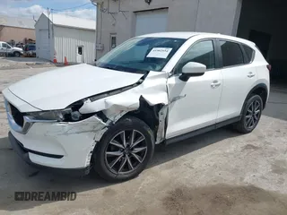 2018 Mazda CX-5 Touring with VIN JM3KFBCMXJ0353369, listed as a IAAI auction lot 41902554 with 154,104 mi miles and . Bid and sale history available at DreamBid. Image 18.