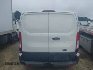2017 Ford Transit z VIN 1FTYE1ZMXHKA13581, wystawiony jako IAAI lot #42638547 z przebiegiem 252 913 mil mil oraz . Historia ofert i sprzedaży dostępna na DreamBid. Obrazek 16.