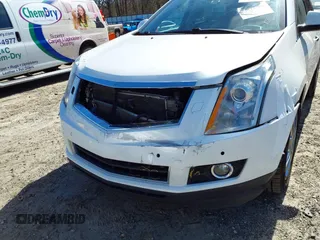 2012 Cadillac SRX Performance Collection with VIN 3GYFNBE33CS614655, listed as a IAAI auction lot 41818918 with 176,899 mi miles. Bid and sale history available at carsss.com. Image 6.