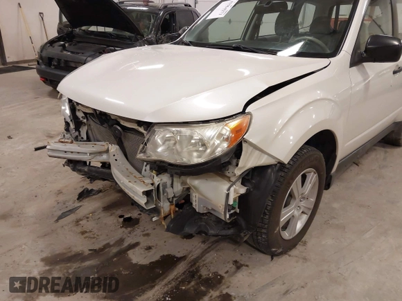 2012 Subaru Forester X with VIN JF2SHBBCXCH433191, listed as a IAAI auction lot 41964271 with 146,176 mi miles and . Bid and sale history available at DreamBid. Image 6.