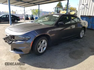 2023 Dodge Charger SXT with VIN 2C3CDXBGXPH563992, listed as a Copart auction lot 51939455 with 60,680 mi miles and Non Repairable. Bid and sale history available at carsss.com. Image 1.