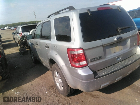 2011 Ford Escape XLT with VIN 1FMCU9DG2BKA63519, listed as a IAAI auction lot 36458159 with 168,475 mi miles. Bid and sale history available at carsss.com. Image 3.