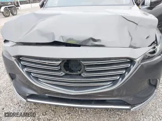 2016 Mazda CX-9 Grand Touring with VIN JM3TCBDY1G0103560, listed as a IAAI auction lot 41344813 with 123,588 mi miles. Bid and sale history available at carsss.com. Image 6.