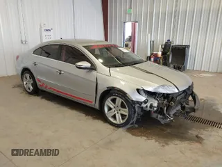 2015 Volkswagen CC Sport with VIN WVWBN7AN1FE816059, listed as a IAAI auction lot 41857589 with 172,854 mi miles and . Bid and sale history available at DreamBid. Image 1.