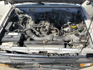 1992 Toyota Pickup z VIN JT4RN81A1N0094217, wystawiony jako Copart lot #56062545 z przebiegiem 242 256 mil mil oraz Szkoda całkowita • Salvage title. Historia ofert i sprzedaży dostępna na DreamBid. Obrazek 11.