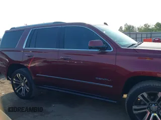 2017 GMC Yukon Denali with VIN 1GKS1CKJ4HR141145, listed as a IAAI auction lot 40799652 with 104,369 mi miles. Bid and sale history available at carsss.com. Image 12.