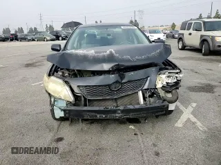 2010 Toyota Corolla with VIN JTDBU4EE3A9123331, listed as a Copart auction lot 60869295 with 185,744 mi miles and Salvage title. Bid and sale history available at DreamBid. Image 13.