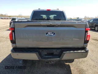 2024 Ford F-150 Lightning Flash с VIN 1FT6W3L74RWG04714, выставлен на аукционе Copart как лот 56320265 с пробегом 13 454 миль миль и Списание • Salvage title. История ставок и продаж доступна на DreamBid. Изображение 6.