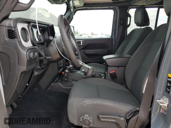 2024 Jeep Wrangler Sport S with VIN 1C4PJXDN4RW124924, listed as a Copart auction lot 50516555 with 7,747 mi miles and Salvage Title. Bid and sale history available at DreamBid. Image 7.