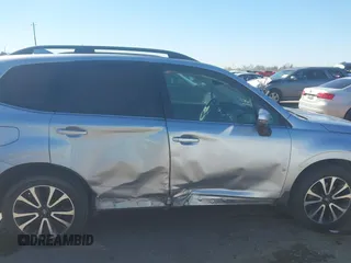 2017 Subaru Forester Touring with VIN JF2SJGTC9HH409665, listed as a IAAI auction lot 41749546 with 118,635 mi miles. Bid and sale history available at carsss.com. Image 13.
