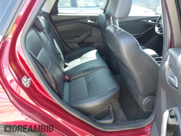 2015 Ford Focus Titanium with VIN 1FADP3J29FL230664, listed as a IAAI auction lot 41870083 with 125,578 mi miles and . Bid and sale history available at DreamBid. Image 8.