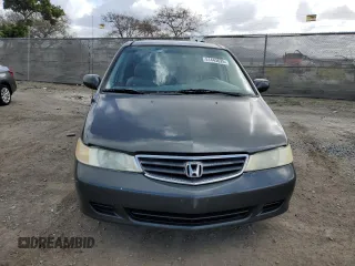 2004 Honda Odyssey EX-L with VIN 5FNRL18944B052617, listed as a Copart auction lot 51443625 with 144,346 mi miles and Salvage Title. Bid and sale history available at DreamBid. Image 5.