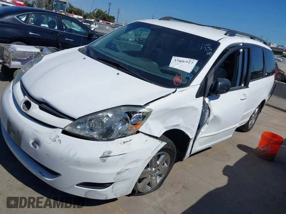 2010 Toyota Sienna CE with VIN 5TDKK4CC4AS293772, listed as a IAAI auction lot 39408854 with 118,238 mi miles and . Bid and sale history available at DreamBid. Image 2.
