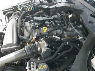 2024 Ford Mustang EcoBoost с VIN 1FAGP8UH1R5125555, выставлен на аукционе IAAI как лот 42818130 с пробегом 19 300 миль миль и . История ставок и продаж доступна на DreamBid. Изображение 22.