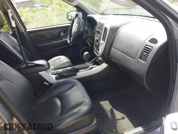 2007 Mercury Mariner Luxury with VIN 4M2CU91157KJ09026, listed as a IAAI auction lot 42312495 with 156,572 mi miles and . Bid and sale history available at DreamBid. Image 5.