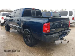 2007 Dodge Dakota SLT with VIN 1D7HE48K07S137252, listed as a IAAI auction lot 41385640 with 223,920 mi miles and . Bid and sale history available at carsss.com. Image 3.