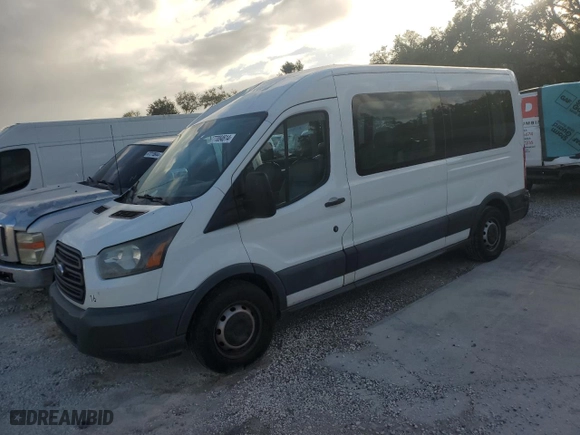 2016 Ford Transit Wagon XL with VIN 1FBZX2CM5GKA21099, listed as a Copart auction lot 77084614 with 128,446 mi miles and Salvage Title. Bid and sale history available at carsss.com. Image 1.