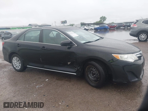 2014 Toyota Camry L with VIN 4T1BF1FK0EU823710, listed as a IAAI auction lot 42153523 with 105,468 mi miles and . Bid and sale history available at DreamBid. Image 6.