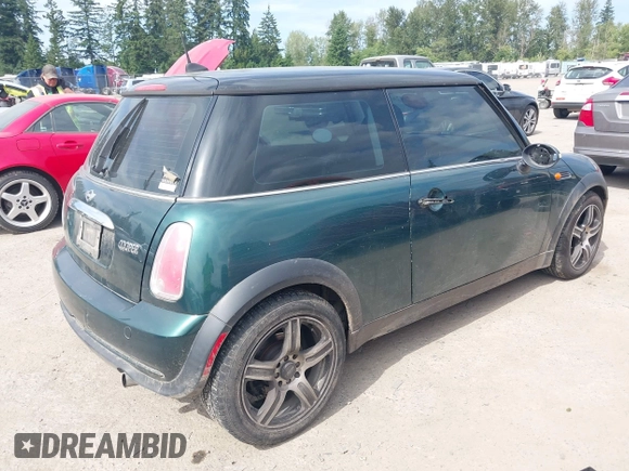2005 MINI Hardtop with VIN WMWRC334X5TC59101, listed as a IAAI auction lot 42467671 with 180,264 mi miles and . Bid and sale history available at DreamBid. Image 4.