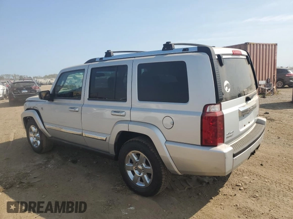 2007 Jeep Commander Limited with VIN 1J8HG58P87C595890, listed as a Copart auction lot 71123654 with 148,438 mi miles and Salvage Title. Bid and sale history available at carsss.com. Image 2.
