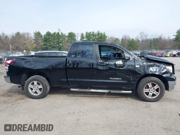 2007 Toyota Tundra SR5 z VIN 5TFBT54117X005726, wystawiony jako IAAI lot #42105716 z przebiegiem 84 828 mil mil oraz . Historia ofert i sprzedaży dostępna na DreamBid. Obrazek 13.