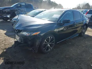 2018 Toyota Camry LE z VIN 4T1B11HK4JU151656, wystawiony jako IAAI lot #41524694 z przebiegiem 52 581 mil mil oraz . Historia ofert i sprzedaży dostępna na DreamBid. Obrazek 18.