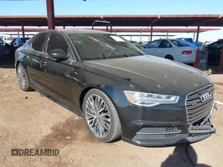 2016 Audi A6 2.0T Premium Plus with VIN WAUGFAFC8GN103391, listed as a IAAI auction lot 41341007 with 130,581 mi miles. Bid and sale history available at carsss.com. Image 1.