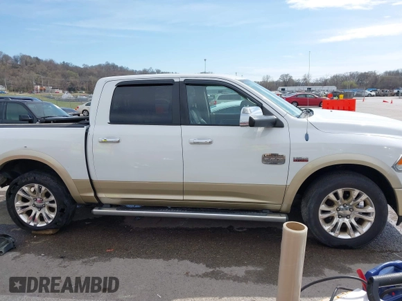 2014 Ram 1500 Longhorn Limited with VIN 1C6RR7PT9ES127063, listed as a IAAI auction lot 41817112 with 126,203 mi miles and . Bid and sale history available at DreamBid. Image 14.