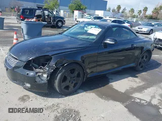 2003 Lexus SC 430 z VIN JTHFN48Y530041126, wystawiony jako IAAI lot #41794578 z przebiegiem 143 391 mil mil oraz . Historia ofert i sprzedaży dostępna na DreamBid. Obrazek 2.