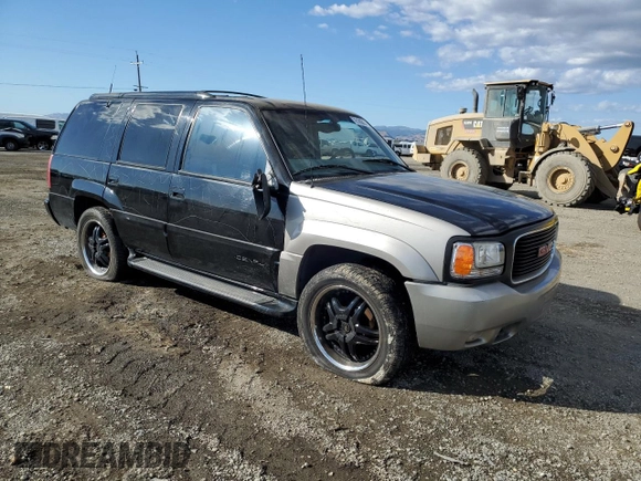 2000 GMC Denali z VIN 1GKEK13R8YR109690, wystawiony jako Copart lot #76165584 z przebiegiem 153 366 mil mil oraz Szkoda całkowita • Salvage title. Historia ofert i sprzedaży dostępna na DreamBid. Obrazek 4.