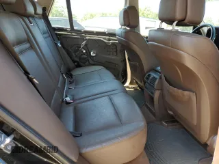 2012 BMW X5 35i z VIN 5UXZV4C52CL748838, wystawiony jako Copart lot #58051155 z przebiegiem 224 088 mil mil oraz Czysty tytuł • Clean title. Historia ofert i sprzedaży dostępna na DreamBid. Obrazek 11.