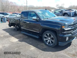 2018 Chevrolet Silverado 1500 with VIN 1GCVKSEC3JZ125571, listed as a IAAI auction lot 41982881 with 58,410 mi miles and . Bid and sale history available at DreamBid. Image 6.