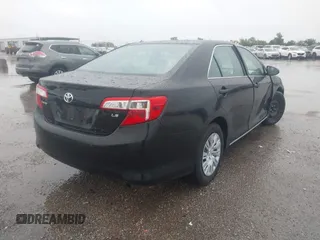 2014 Toyota Camry L with VIN 4T1BF1FK0EU823710, listed as a IAAI auction lot 42153523 with 105,468 mi miles and . Bid and sale history available at DreamBid. Image 4.