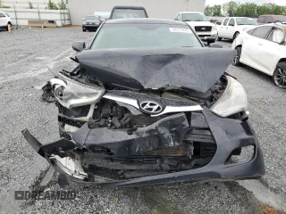2013 Hyundai Veloster w/Gray Int с VIN KMHTC6AD8DU113990, выставлен на аукционе Copart как лот 54571895 с пробегом 181 757 миль миль и Списание • Salvage title. История ставок и продаж доступна на DreamBid. Изображение 5.