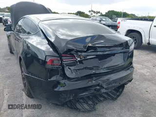 2023 Tesla Model S with VIN 5YJSA1E53PF510757, listed as a IAAI auction lot 42075624 with Not provided miles and . Bid and sale history available at DreamBid. Image 6.