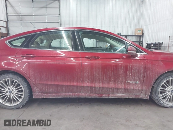 2014 Ford Fusion SE Hybrid with VIN 3FA6P0LU5ER136237, listed as a IAAI auction lot 41590088 with 174,009 mi miles. Bid and sale history available at carsss.com. Image 13.