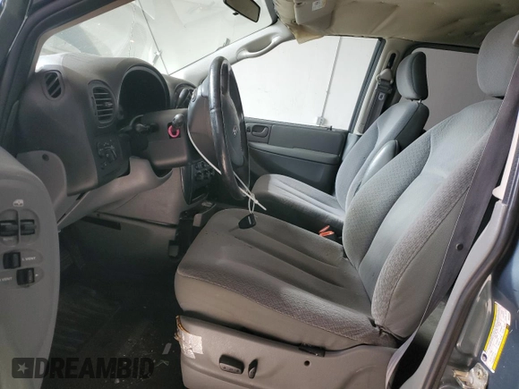 2005 Dodge Caravan SXT with VIN 2D4GP44L95R462451, listed as a Copart auction lot 50413125 with 148,573 mi miles and Salvage title. Bid and sale history available at DreamBid. Image 7.