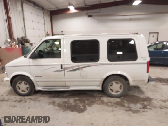 1998 Chevrolet Astro Cargo Van YF7 Upfitter with VIN 1GBDM19W1WB121821, listed as a IAAI auction lot 41463704 with 141,724 mi miles. Bid and sale history available at carsss.com. Image 14.