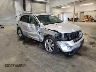 2011 Jeep Grand Cherokee 70th Anniversary with VIN 1J4RR4GG0BC666357, listed as a Copart auction lot 71726674 with 122,802 mi miles and Salvage Title. Bid and sale history available at carsss.com. Image 12.