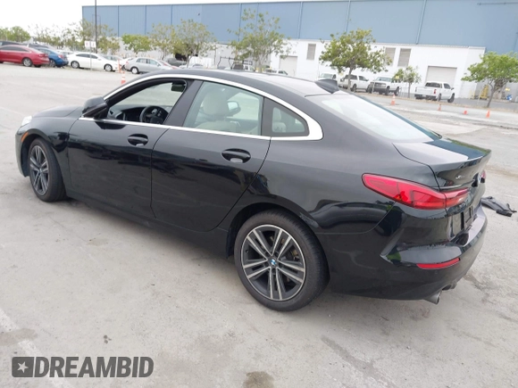 2020 BMW 2 Series 228i xDrive with VIN WBA73AK01L7F85126, listed as a IAAI auction lot 42110803 with 33,411 mi miles and . Bid and sale history available at carsss.com. Image 3.