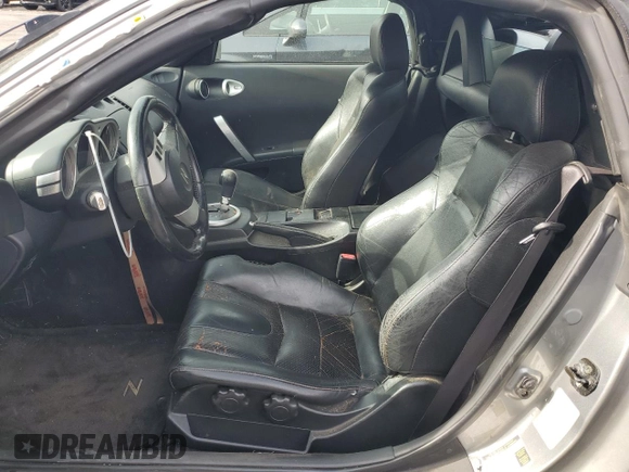 2004 Nissan 350Z Touring z VIN JN1AZ36A44M253626, wystawiony jako Copart lot #79089504 z przebiegiem 138 345 mil mil oraz Szkoda całkowita • Salvage title. Historia ofert i sprzedaży dostępna na DreamBid. Obrazek 7.