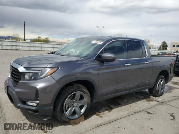 2023 Honda Ridgeline RTL-E with VIN 5FPYK3F78PB010961, listed as a Copart auction lot 51458635 with 33,508 mi miles and Salvage title. Bid and sale history available at DreamBid. Image 1.