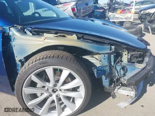 2019 Tesla Model 3 Long Range with VIN 5YJ3E1EB3KF497841, listed as a IAAI auction lot 41969728 with 21,127 mi miles. Bid and sale history available at carsss.com. Image 6.
