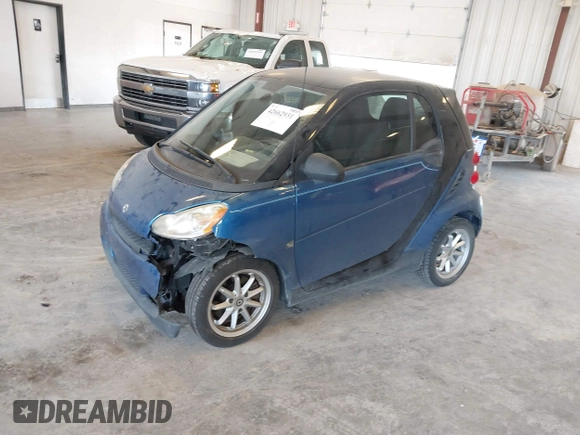 2009 Smart fortwo Pure with VIN WMEEJ31X89K228315, listed as a IAAI auction lot 42662931 with 60,666 mi miles and . Bid and sale history available at DreamBid. Image 2.