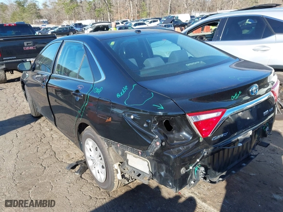 2015 Toyota Camry Hybrid LE with VIN 4T1BD1FK7FU167027, listed as a IAAI auction lot 41697235 with 253,152 mi miles. Bid and sale history available at carsss.com. Image 3.