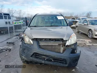 2006 Honda CR-V LX z VIN SHSRD78546U419783, wystawiony jako IAAI lot #41651042 z przebiegiem 162 131 mil mil oraz . Historia ofert i sprzedaży dostępna na DreamBid. Obrazek 12.