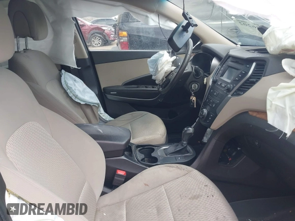 2014 Hyundai Santa Fe with VIN 5XYZUDLB6EG213889, listed as a IAAI auction lot 42036202 with 188,247 mi miles and . Bid and sale history available at DreamBid. Image 5.