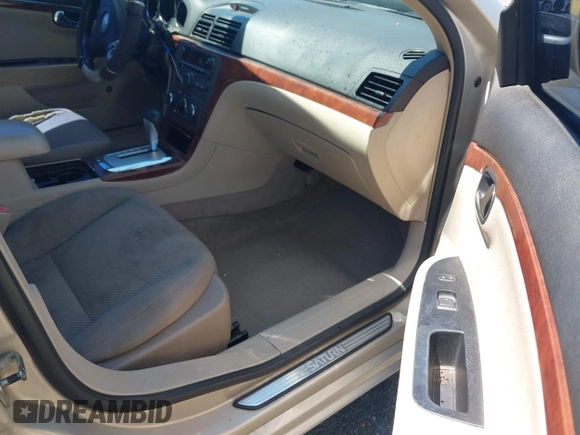 2009 Saturn Aura XE with VIN 1G8ZS57BX9F208557, listed as a IAAI auction lot 42043106 with 152,530 mi miles and . Bid and sale history available at DreamBid. Image 5.