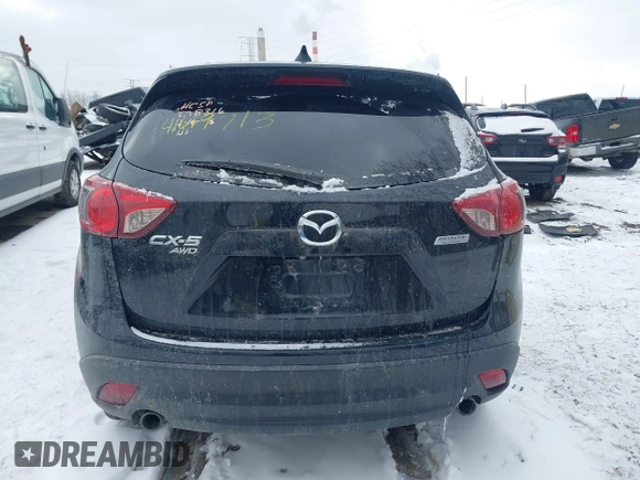 2014 Mazda CX-5 Touring with VIN JM3KE4CY8E0416590, listed as a IAAI auction lot 41619713 with 225,156 mi miles. Bid and sale history available at carsss.com. Image 17.