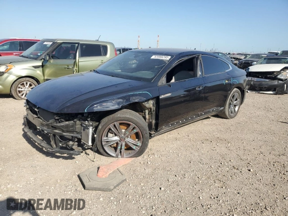 2023 Volkswagen Arteon SEL R-Line z VIN WVWSR7AN7PE003928, wystawiony jako Copart lot #52088295 z przebiegiem 26 682 mil mil oraz Szkoda całkowita • Salvage title. Historia ofert i sprzedaży dostępna na DreamBid. Obrazek 1.